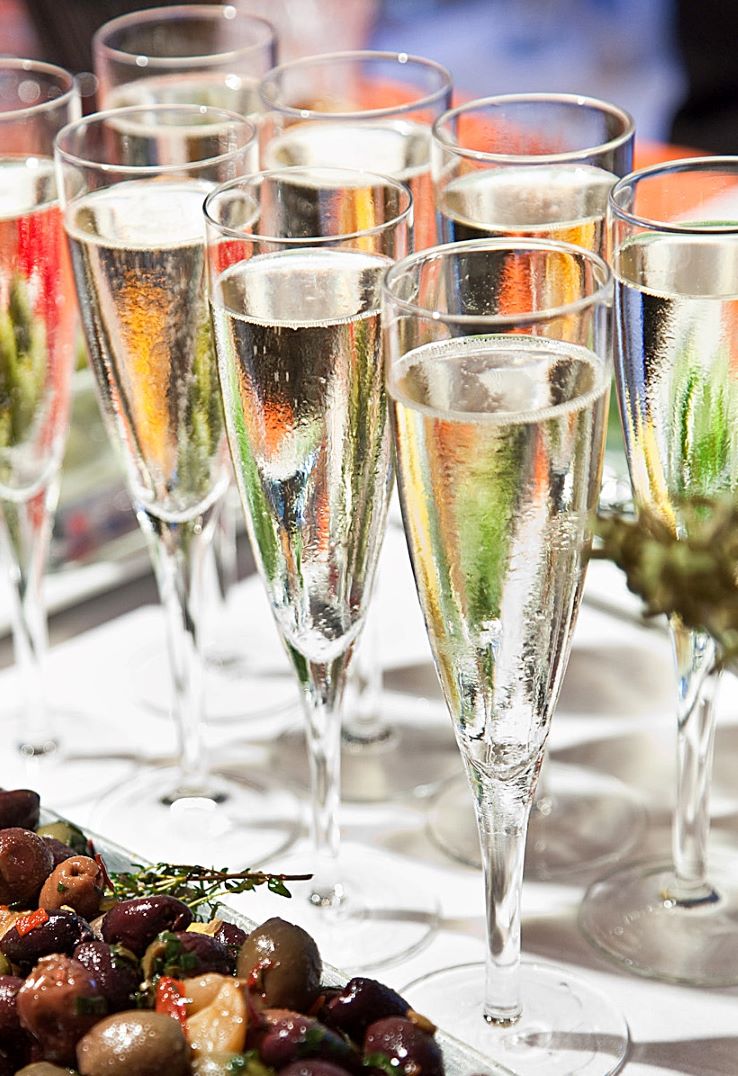 A platter of champagne flutes.