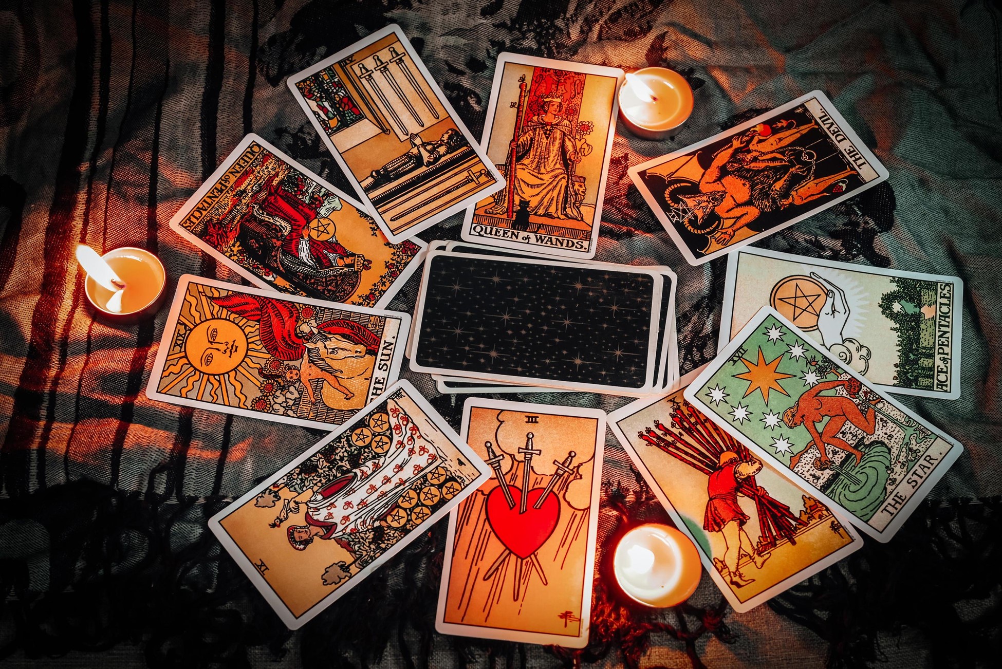 Tarot cards spread in a circle on a table.