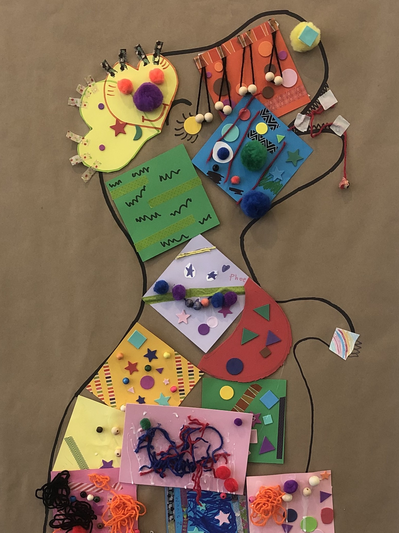 A drawing of a dinosaur covered in decorations.