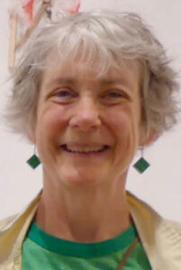 Artist Maggie Rose in the studio space